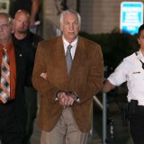 BELLEFONTE, PA - JUNE 22:  Former Penn State assistant football coach Jerry Sandusky, leaves court in handcuffs after being convicted in his child sex abuse trial at the Centre County Courthouse on June 22, 2012 in Bellefonte, Pennsylvania. The jury found Sandusky guilty on 45 of 48 counts in the sexual abuse trial of the former Penn State assistant football coach, who was charged with sexual abuse of 10 boys over a 15-year period.  (Photo by Mark Wilson/Getty Images)