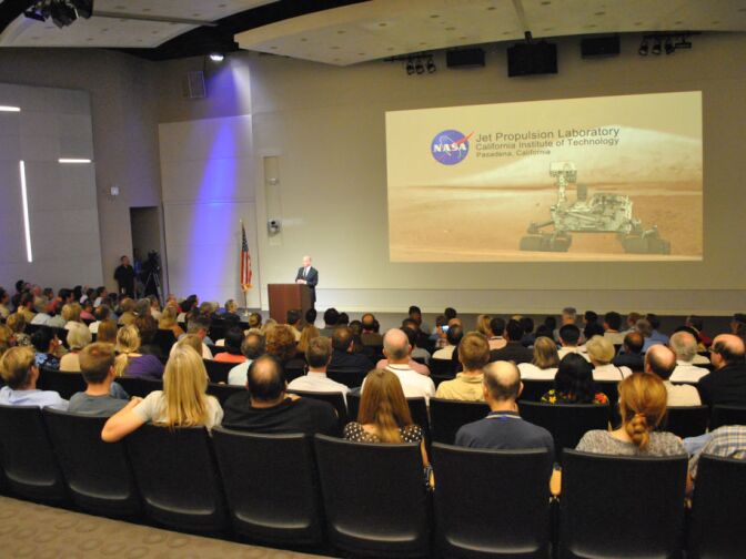 Jet Propulsion Laboratory staff members listen to Governor Jerry brown's speech during his visit. 
