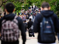 LOS ANGELES, CA - APRIL 23:  Students walk across the campus of UCLA on April 23, 2012 in Los Angeles, California. According to reports, half of recent college graduates with bachelor's degrees are finding themselves underemployed or jobless.  (Photo by Kevork Djansezian/Getty Images)