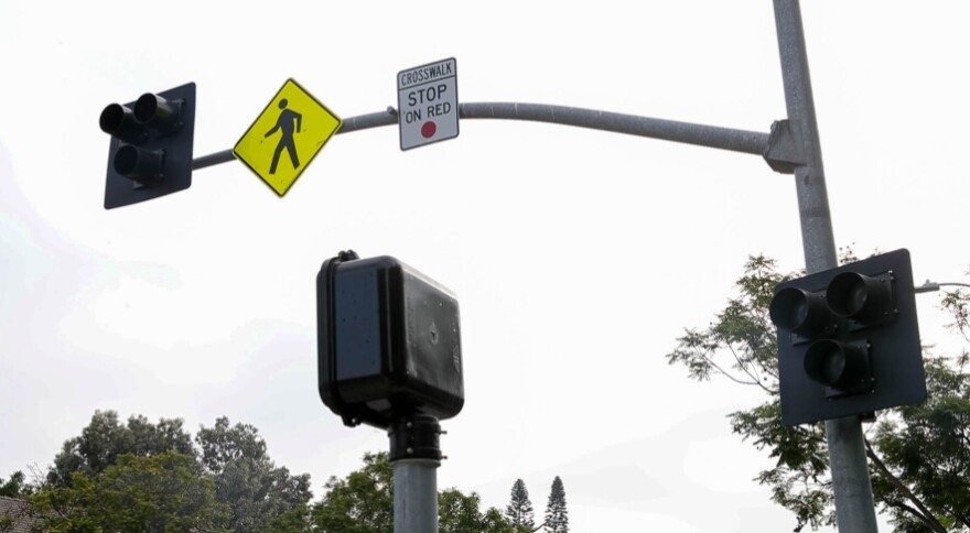 A new HAWK (High-intensity Activated crossWalK) beacon was unveiled on 6th Street north of Hancock Park in L.A.'s Miracle Mile neighborhood. (Courtesy of LADOT)