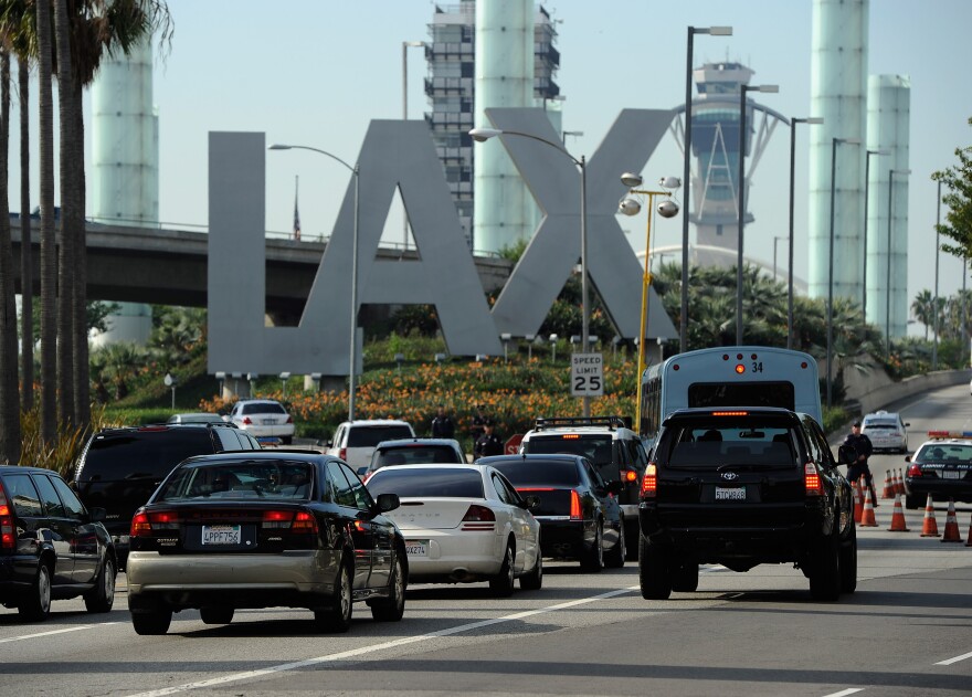 LOS ANGELES, CA - NOVEMBER 23:  Travelers are stopped at a security check point at Los Angeles International Airport on November 23, 2011 in Los Angeles, California. Orbitz named LAX as the nation's busiest airport for 2011 Thanksgiving travel.  (Photo by Kevork Djansezian/Getty Images)