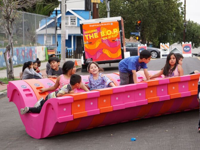 Children play at a Pop up play streets event.