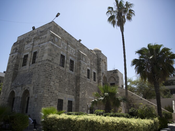 Palm trees grow in the garden of the historical Pasha's Palace in Gaza City, in 2019.