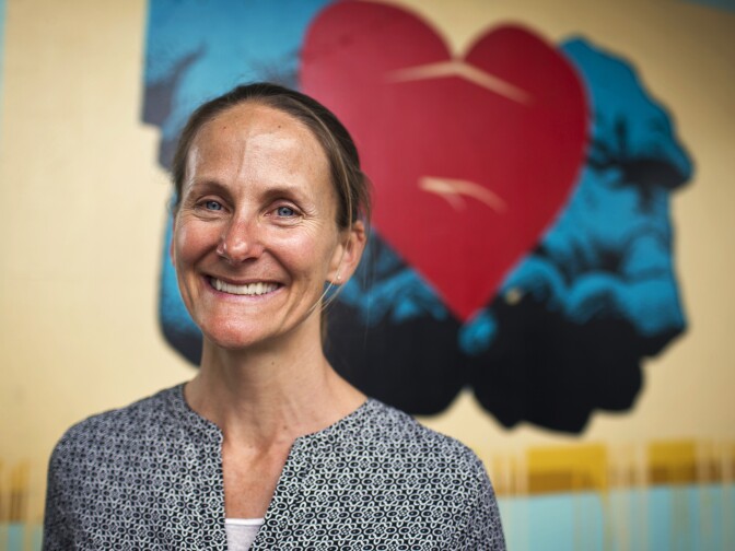 Heather Carmichael is the executive director of My Friend's Place in Hollywood. Three murals cover the exterior walls outside MFP, which sits adjacent to an on-ramp to the 101 Freeway.