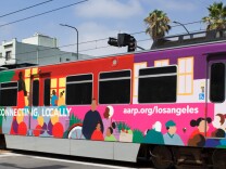 AARP commissioned this painting to wrap an LA Metro train as a way of highlighting the importance of transit to older people. The organization collaborated on Metro's first "Older Adult Transportation Expo."