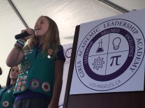 A student from the first class of Girls Academic Leadership Academy (GALA), the first non-charter single-sex school for traditional public school students to open in California in 20 years, sings the national anthem during a ribbon-cutting ceremony on Friday, Aug. 12.