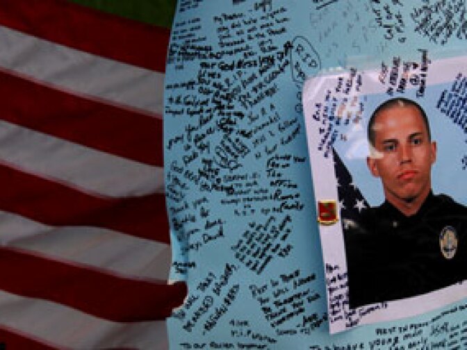 Memorial for slain officer Ryan Bonaminio near the site of his murder in Riverside’s Fairmount Park
