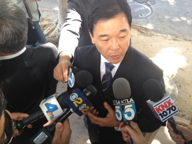 LA sheriff's candidate Paul Tanaka answers questions after testifying in a deputy misconduct trial in federal court.