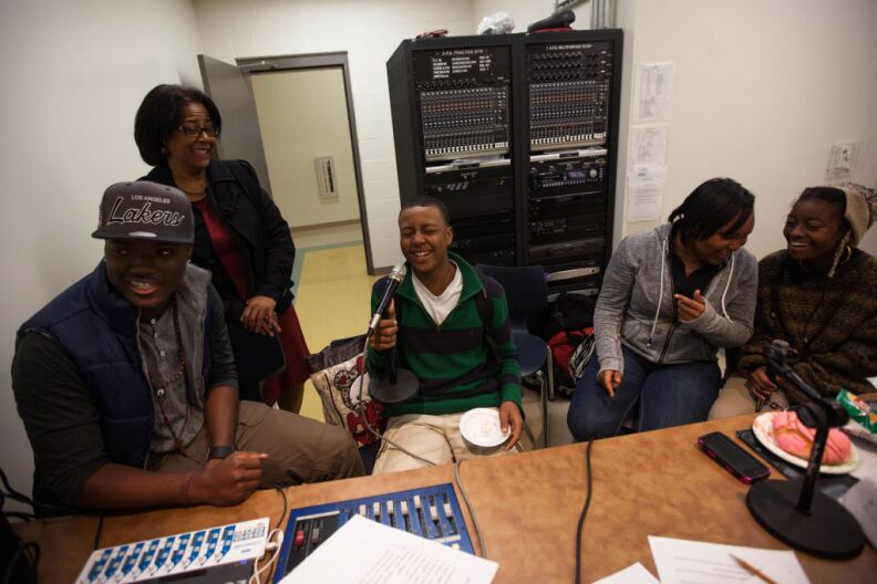 Councilwoman Jan Perry jokes with students from KSWG, the student-run radio station at South Regional High School #12.