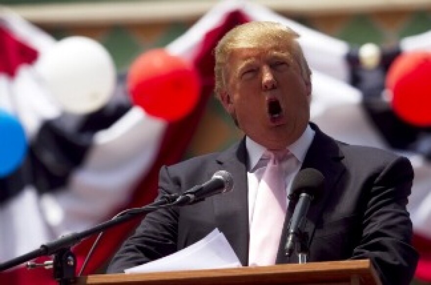Billionaire Donald Trump speaks to a crowd at the 2011 Palm Beach County Tax Day Tea Party April 16, 2011 at Sanborn Square in Boca Raton, Florida.