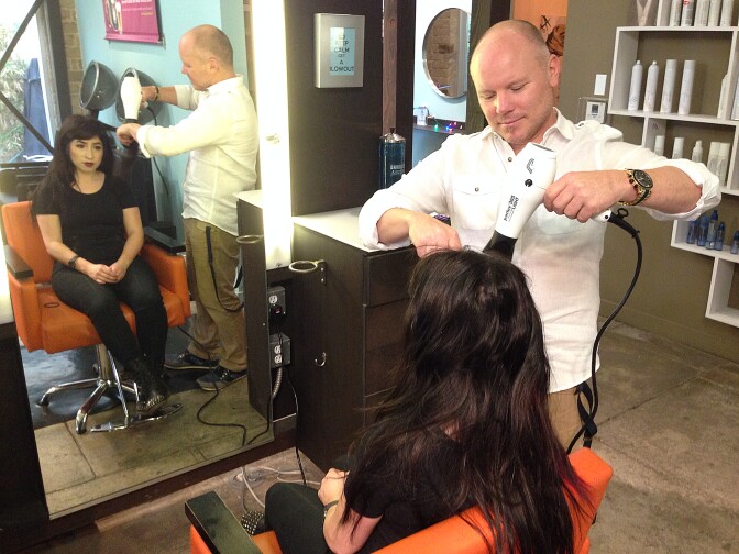 Aubrey Loots, 42, styles hair at the Hair Art and Science Academy in Hollywood. He and partner Danny Leclair own three salons in the LA-area. 