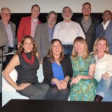 (L-R, First Row) Larry Mantle, Wade Major, Andy Klein, Charles Solomon, Justin Chang, Tim Cogshell (L-R, Second Row) Lael Loewenstein, Claudia Puig, Amy Nicholson and Christy Lemire pose for a photo at AirTalk's FilmWeek at the Egyptian 2016.