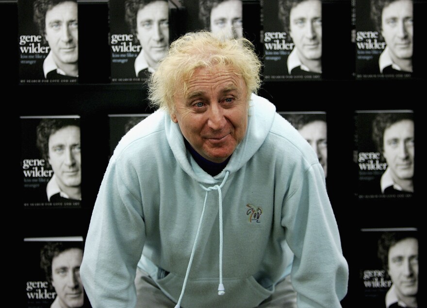 File: Actor Gene Wilder poses as he signs copies of his autobiography Kiss Me Like A Stranger, at Waterstone's, Oxford Street on June 7, 2005 in London, England. The memoirs give an insight into Wilder's failed love life, his experiences of working with stars such as Richard Pryor and Woody Allen, his fight with, and victory over, cancer, and his time in the UK studying acting at the Bristol Old Vic.  