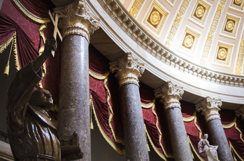 A statue of Father Junipero Serra, the founder of Californias missions and a controversial figure for his role in a process that began the decimation of the Native American population, stands in Statuary Hall in the US Capitol in Washington, DC, January 30, 2015. Pope Francis announced January 29, 2015, his plans to canonize Serra in September 2015 when hes scheduled to visit the East Coast.       AFP PHOTO/JIM WATSON        (Photo credit should read JIM WATSON/AFP/Getty Images)