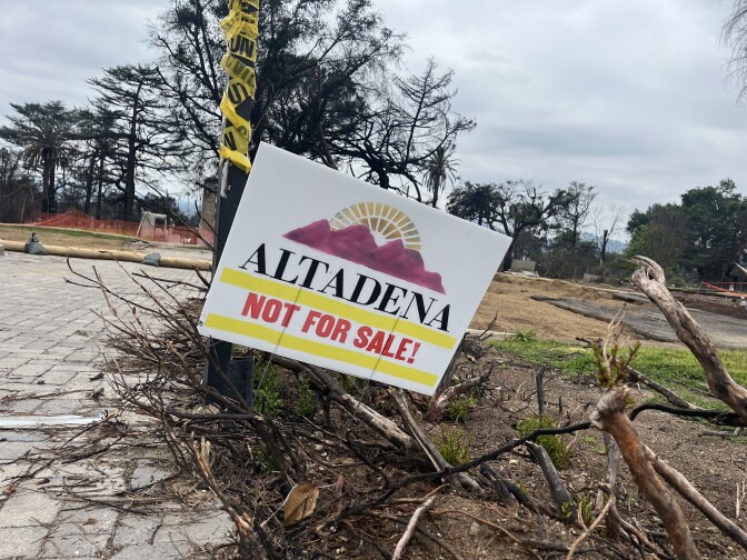 A sign reads "Altadena Not For Sale!"