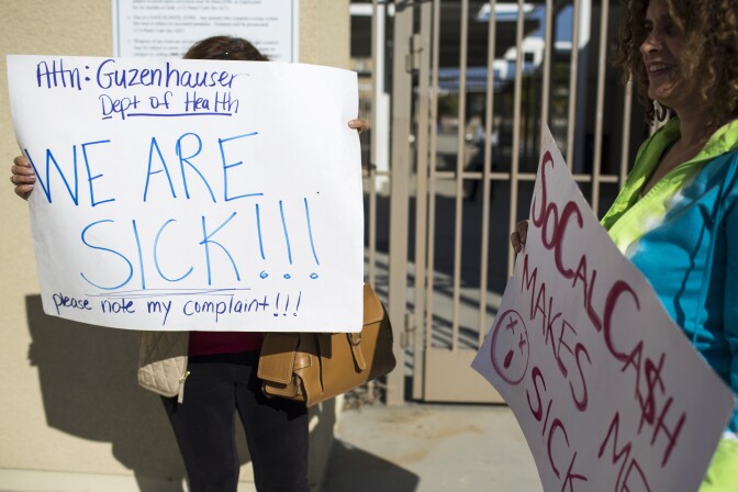 Residents rally before a public health meeting at Porter Ranch Community School on Thursday evening, May 19, 2016 following a fall 2015 gas leak that has forced residents from their homes.