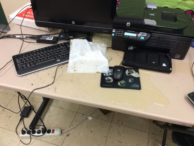 An inspector's photo shows water that has leaked from the ceiling of a classroom at Inglewood High School.