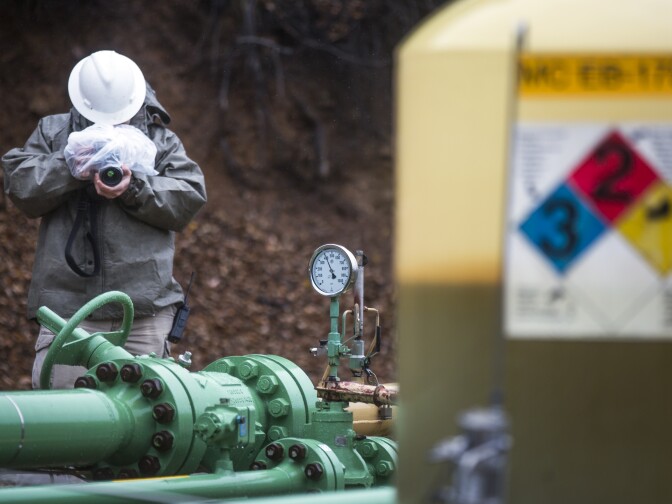 Officials from the Department of Conservation's Division of Oil, Gas and Geothermal Resources and California Public Utilities Commission demonstrate an infra-ref camera during a media event at the Aliso Canyon Natural Gas Storage Facility near Porter Ranch on Thursday, Jan. 12, 2017. The cameras are part of several new safety enhancements being made at the facility following a massive natural-gas leak at the facility in 2015.