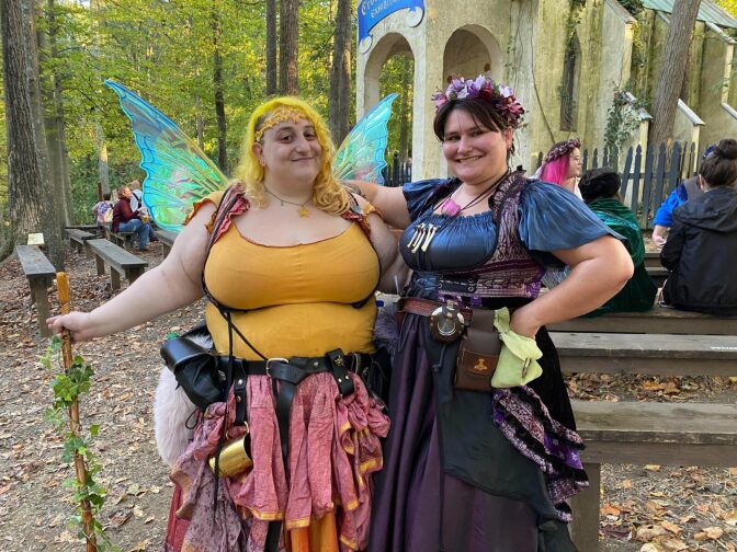 Two attendees at the closing weekend of the Maryland Renaissance Festival, Oct. 2021.
