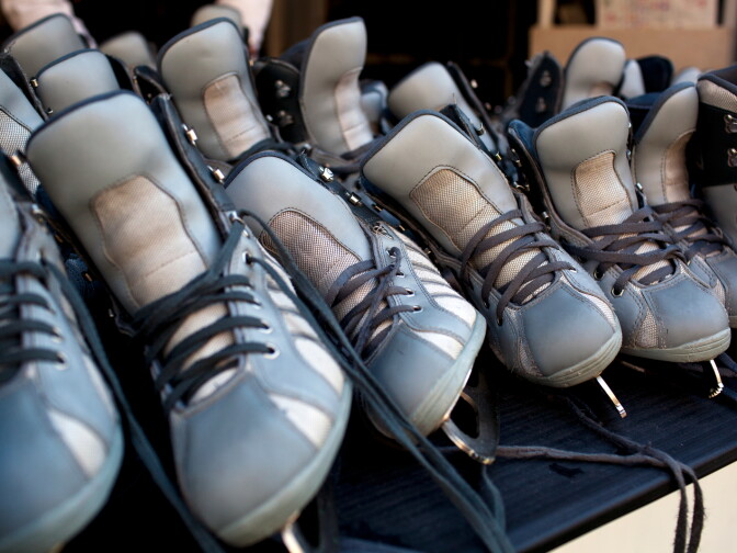 Ice skates are lined up before being handed out during Downtown on Ice at Pershing Square on Christmas Eve.