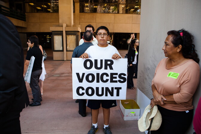 Anaheim has scheduled eight public meetings on the mapping of city council districts even as a lawsuit challenging the city's council election system is headed for a trial. 
(File photo: Anaheim resident, Gabriel Bermirez, 14, says that he sympathizes with feelings of frustration among the Latino community with city leadership and police).