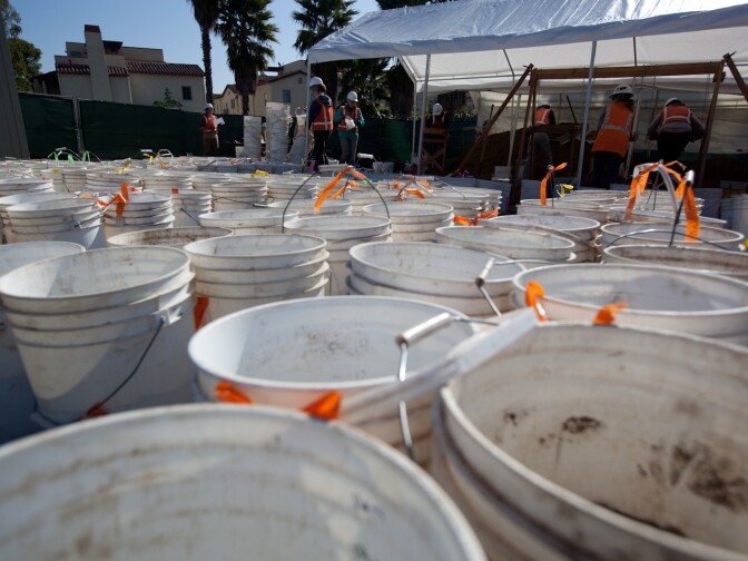 Dozens of buckets of dirt at the site of an excavation near the San Gabriel Mission wait to be excavated on Feb. 2, 2012.