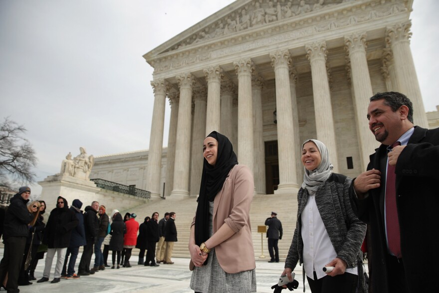 WASHINGTON, DC - FEBRUARY 25:  Samantha Elauf (C), her mother Majda Elauf (2nd R) of Tulsa, Oklahoma, and Equal Employment Opportunity Commission General Counsel David Lopez (R) leave the U.S. Supreme Court after the court heard oral arguments in EEOC v. Abercrombie & Fitch February 25, 2015 in Washington, DC. Elauf filed a charge of religious discrimination with the EEOC saying Abercrombie & Fitch violated discrimination laws in 2008 by declining to hire her because she wore a head scarf, a symbol of her Muslim faith.  (Photo by Chip Somodevilla/Getty Images)