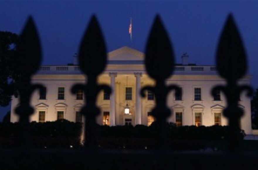 The White House is shown on the evening U.S. President Barack Obama addressed the nation on the debt limit impasse with members of the U.S. Congress July 25, 2011 in Washington, DC.
