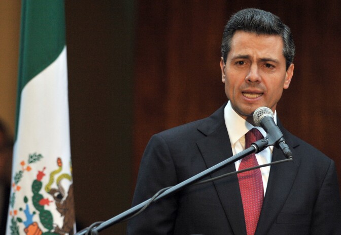 File: The President of Mexico, Enrique Pena Nieto delivers a speech at the National Museum of Costa Rica where he was given the key to the city by the mayor of San Jose Johnny Araya (out of frame) on February 20, 2013 in San Jose. 