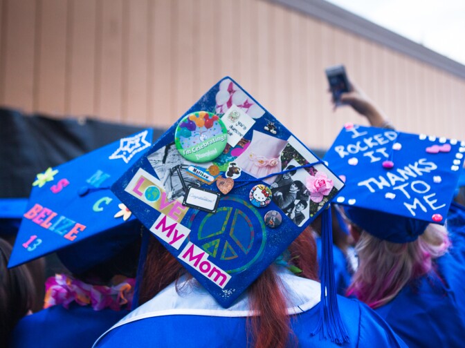 Students take photos before the Santa Monica College graduation on June 11th, 2013.