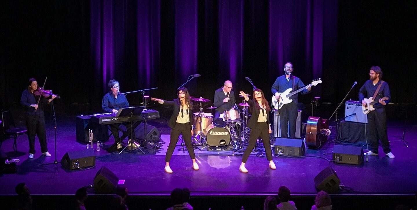 Nancy and Beth (Megan Mullally and Stephanie Hunt) in performance with their band.
