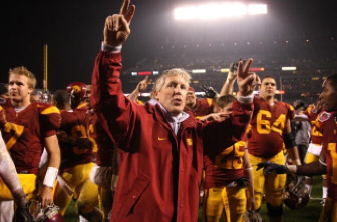 Head coach Pete Carroll of the USC Trojans celebrates after defeating the Boston College Eagles during the 2009 Emerald Bowl at AT&T Park on December 26, 2009 in San Francisco, California.