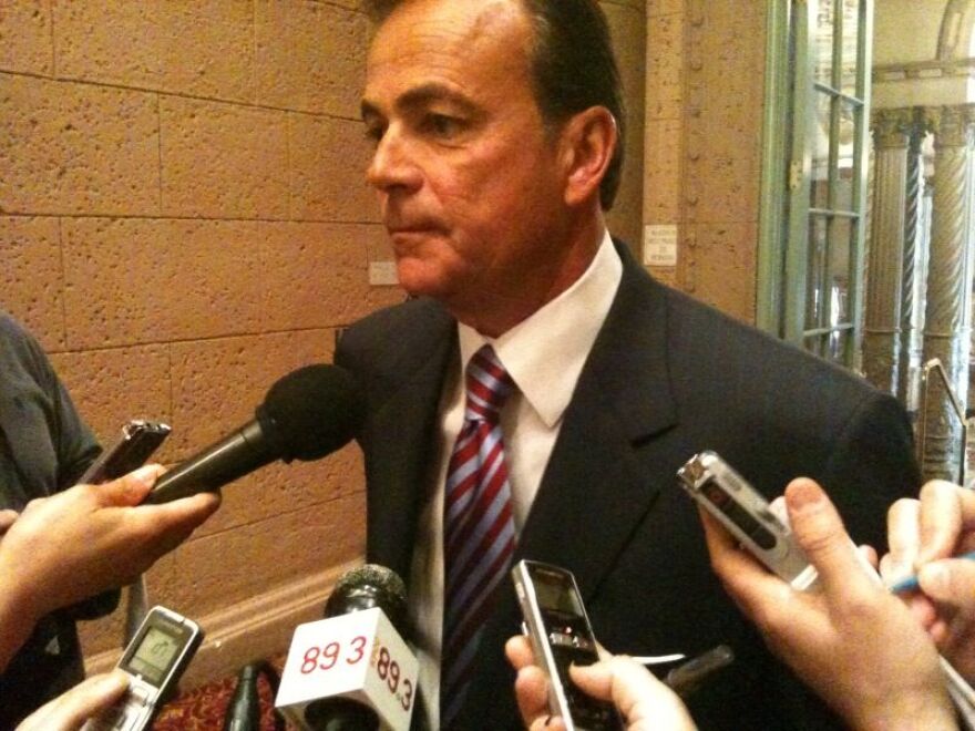 Rick Caruso speaks with reporters at the Biltmore Hotel, where he addressed Town Hall Los Angeles.
