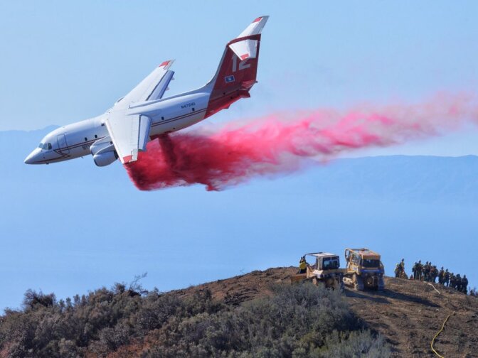 From Santa Barbara County Fire Department spokesman Mike Eliason on Thursday, October 29, 2015: "A BAe-146 air tanker makes a drop on the fire."
