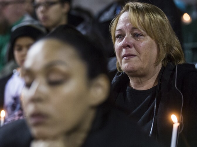 Prayer and songs open a vigil at San Manuel Stadium in San Bernardino on Thursday night, Dec. 3, 2015 following a mass shooting that left 14 people dead and 21 injured on Wednesday at the Inland Regional Center.