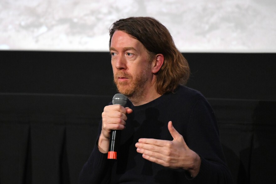NEW YORK, NY - JANUARY 14:  Director Chris Smith speaks on stage during Q&A session after New York screening of Netflix's "FYRE: THE GREATEST PARTY THAT NEVER HAPPENED" at The Metrograph on January 14, 2019 in New York City.  (Photo by Craig Barritt/Getty Images for Netflix)