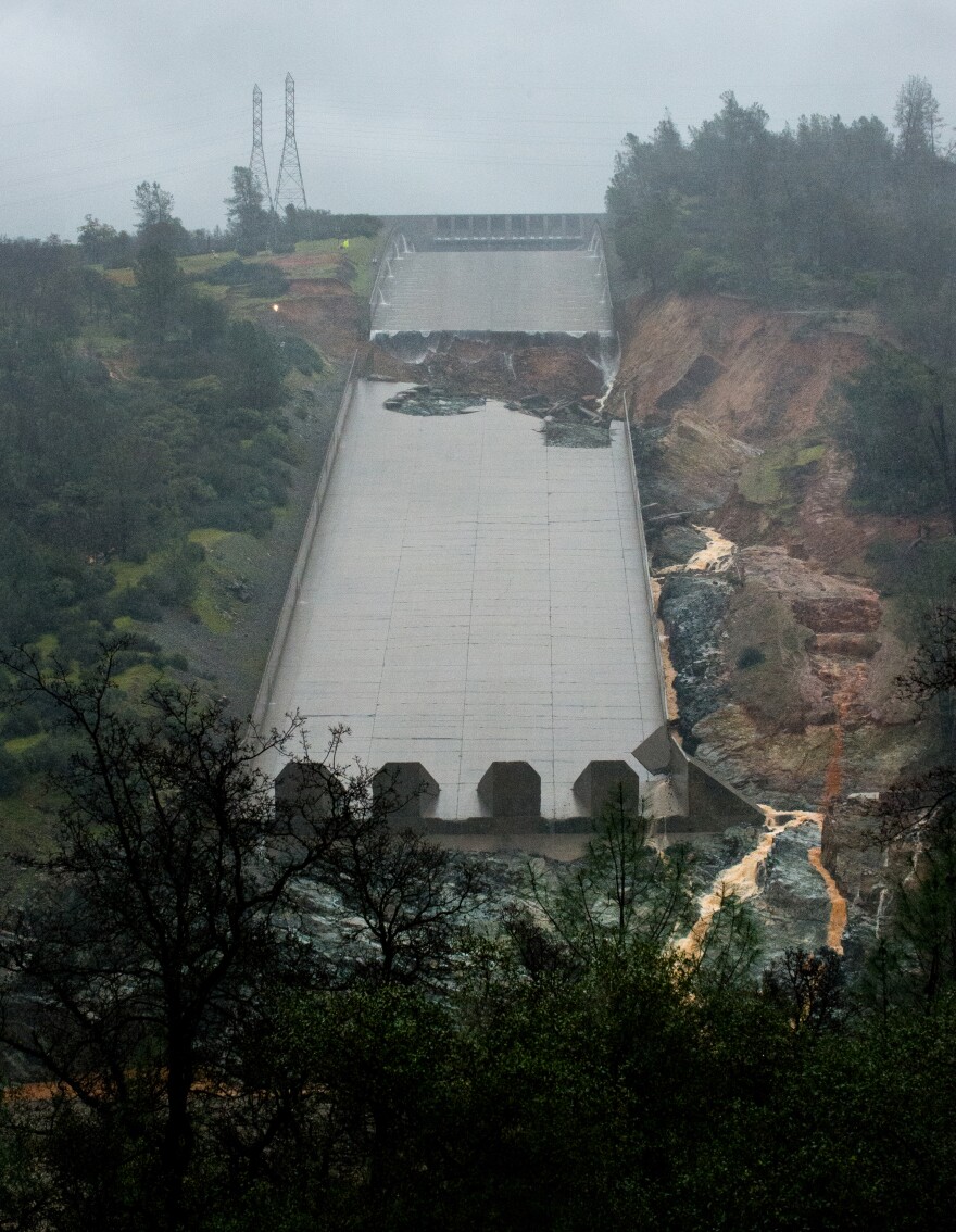 The California Department of Water Resources stopped the spillway flow on Thursday morning to allow engineers to evaluate the integrity of the structure after water had been released at 20,000 cubic feet per second (cfs) through the night. There is no imminent or expected treat to public safety or the integrity of Oroville Dam at the Butte County site. 

After conferring with State and federal dam safety entitles, DWR decided to increase the release volume to 35,000 cfs to help operators absorb the inflow of the storm waters expected today and Friday. More erosion is  also expected. Photo taken February 9, 2017. 

Kelly M. Grow/ California Department of Water
Resources