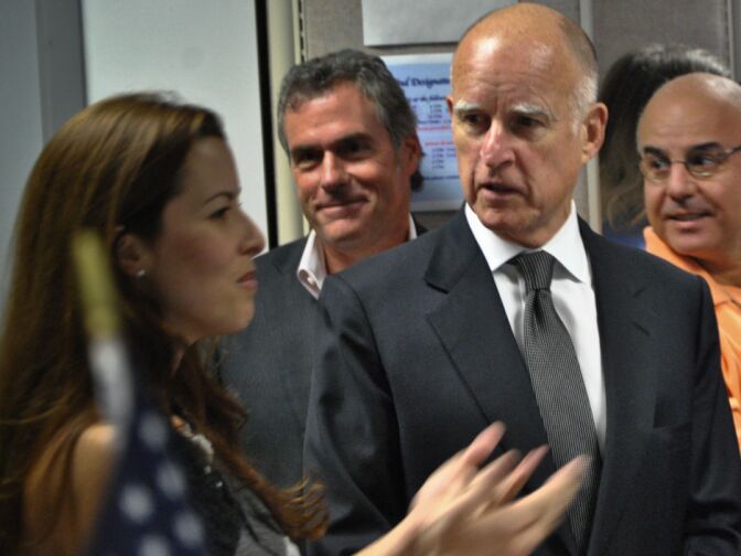 Governor Jerry Brown enters the The Mars Curiosity rover environmental monitoring station on August 22, 2012 at NASA's Jet Propulsion Laboratory. 
