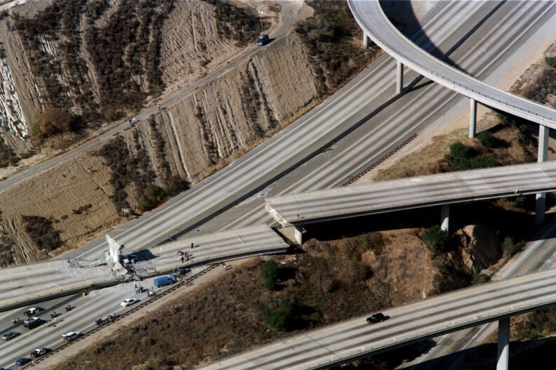 Aeria view of wrecked cars litter the connector ramp from Interstate 5 to Highway 14 following the Northridge earthquake, on Jan. 17, 1994, in Northridge, California. During Northridge earthquake damage was widespread, sections of major freeways collapsed, parking structures and office buildings collapsed, and numerous apartment buildings suffered irreparable damage.