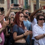 BARCELONA, SPAIN - AUGUST 18:  People clap after walking along Las Ramblas after a minute's silence following yesterday's terrorist attack, on August 18, 2017 in Barcelona, Spain. Fourteen people were killed and dozens injured when a van hit crowds in the Las Ramblas area of Barcelona on Thursday. Spanish police have also killed five suspected terrorists in the town of Cambrils to stop a second terrorist attack.  (Photo by Carl Court/Getty Images)