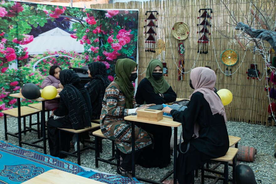 Afghan women are waiting to order food in the Banowan-e-Afghan restaurant in Kabul. The name means "Afghan ladies" (men can order carryout). It's providing jobs for women and a welcoming space to eat — although there are concerns about the Taliban's reaction.