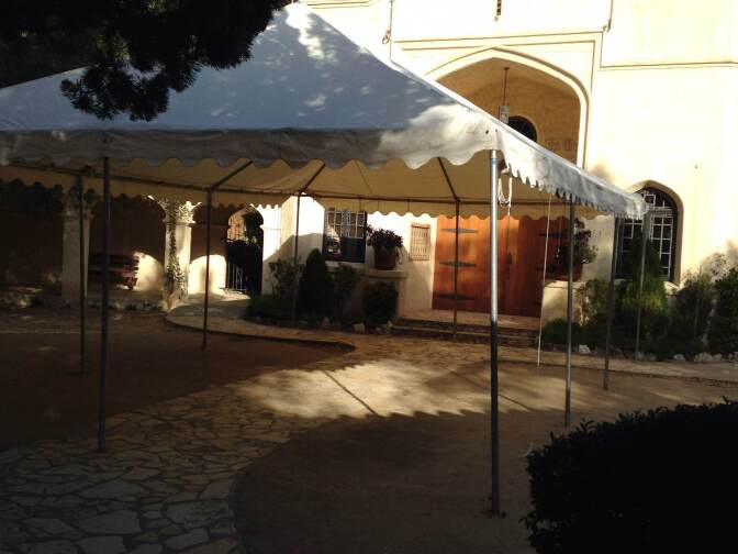 Services at Ananda Ashrama have grown so much that Sunday service crowds spills out into this tent.