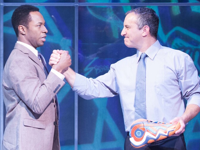 Burl Moseley (left) and Bruce Nozick in a scene showing the newly designed sneaker.
