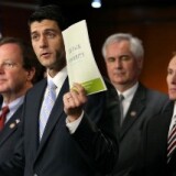 Flanked by other congressional members, U.S. Rep. Paul Ryan (R-WI) (C), chairman of the House Budget Committee, holds up a copy of the 2012 Republican budget proposal during a news conference April 5, 2011 on Capitol Hill in Washington, DC.