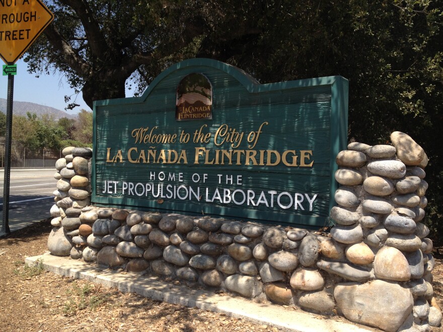 This sign sits at the corner of Oak Grove Drive and Foothill Boulevard announcing the city's pride, a block away from the entrance of the Jet Propulsion Laboratory. 