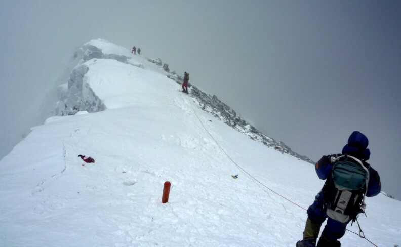 In this photograph taken on May 19, 2009, unidentified mountaineers descend from the summit of Everest. Four climbers have been killed returning from the summit of Mount Everest, tour agents and officials said on May 21, 2012, bringing the season's death toll to six on the world's highest peak. 