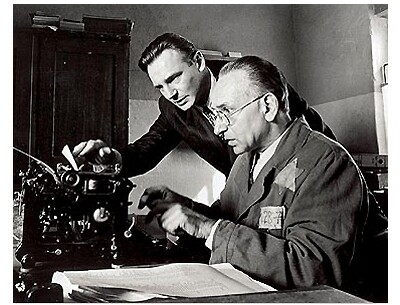 Liam Neeson as Oskar Schindler and Ben Kingsley as Itzhak Stern in Universal Pictures' 'Schindler's List'