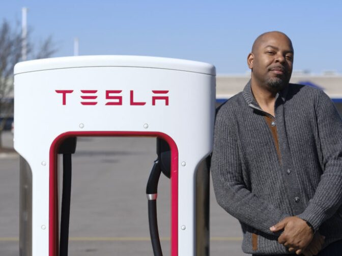 Roger Croney, a former Telsa employee, poses for a portrait at a Tesla charging station in Ft. Wayne, Ind. Thursday, March 22, 2018. (Photo by AJ Mast for The Center for Investigative Reporting) 