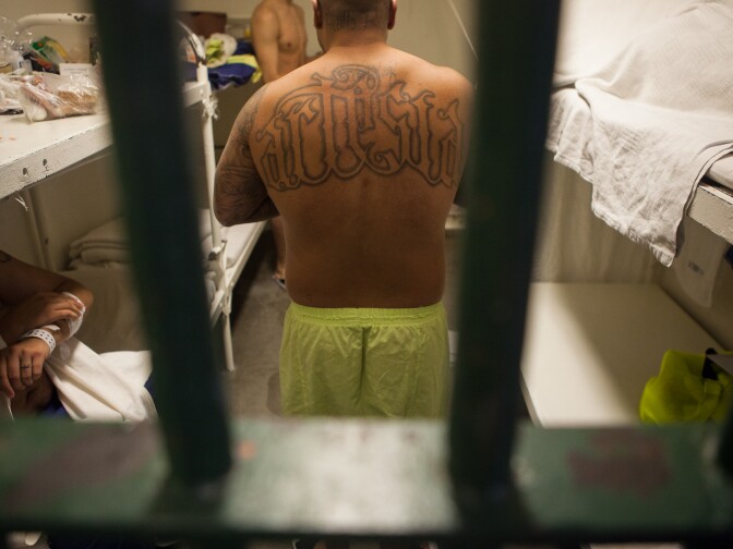 A prisoner in Men's Central Jail in downtown Los Angeles speaks with his cellmates in this photo from December 2011.