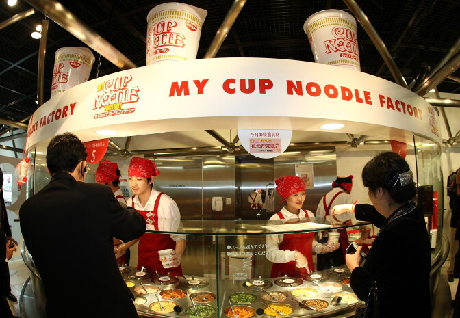 Visitors order their own cup noodle at the Instant Ramen Museum on April 8, 2008 in Osaka, Japan. It has been fifty years since Momofuku Ando, founder of Nissin Food Products Co., Ltd. first invented instant noodle "Chicken Ramen".